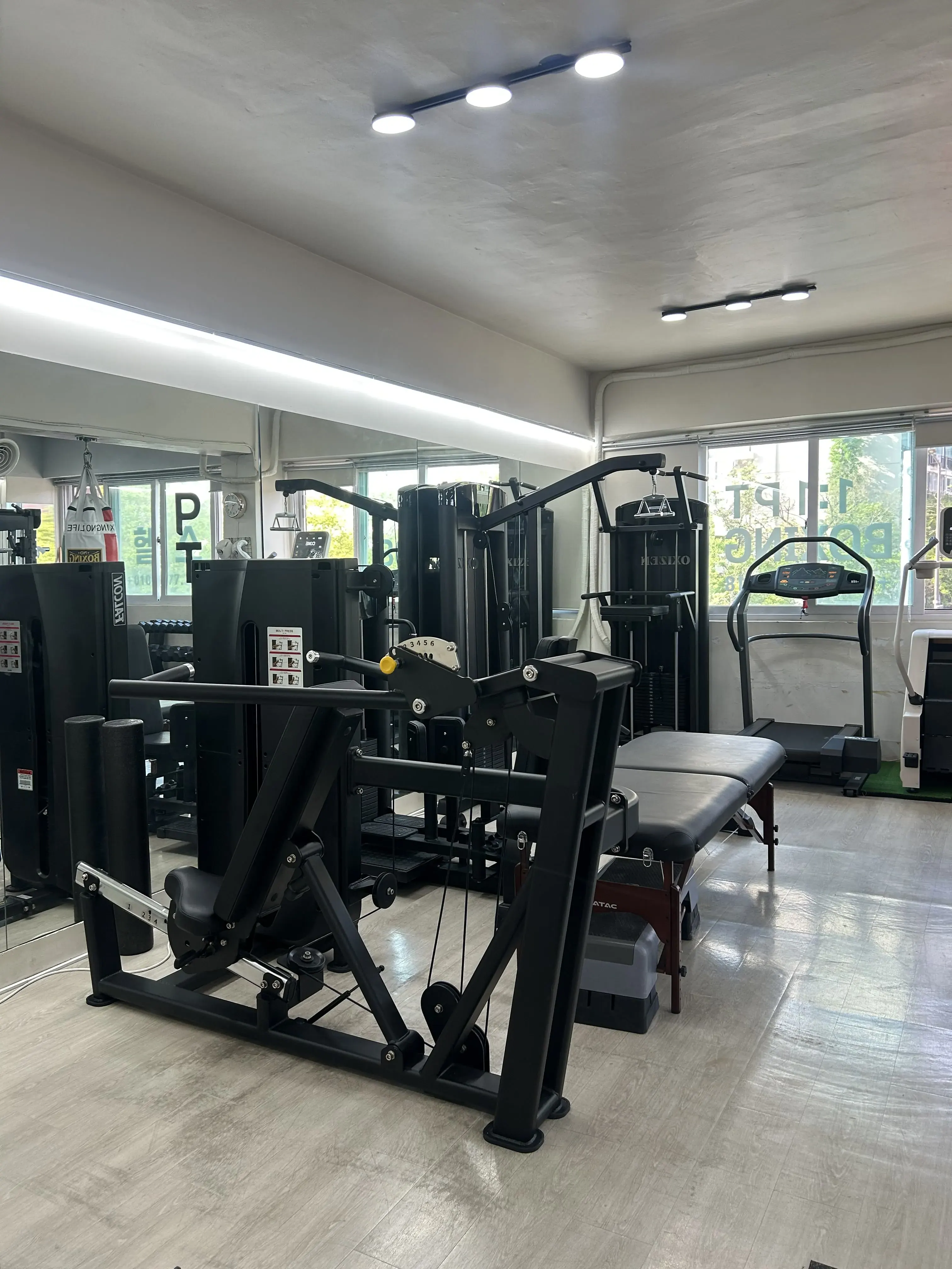 BODY SMITH private training space prepared for boxing, conditioning, and weight training