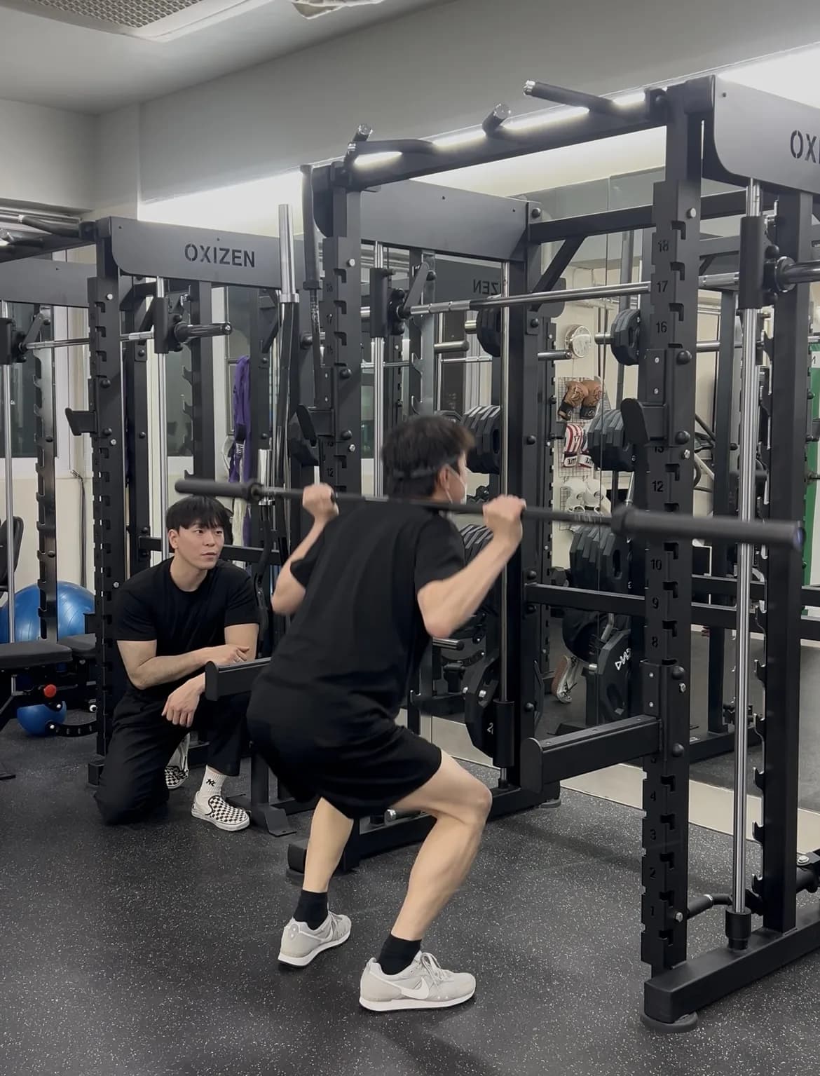 One-on-one private strength coaching session at BODY SMITH