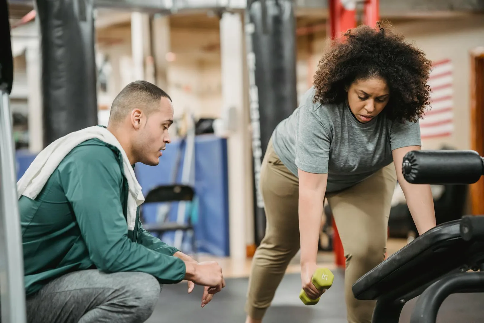 Are group classes or personal training better for beginners?
